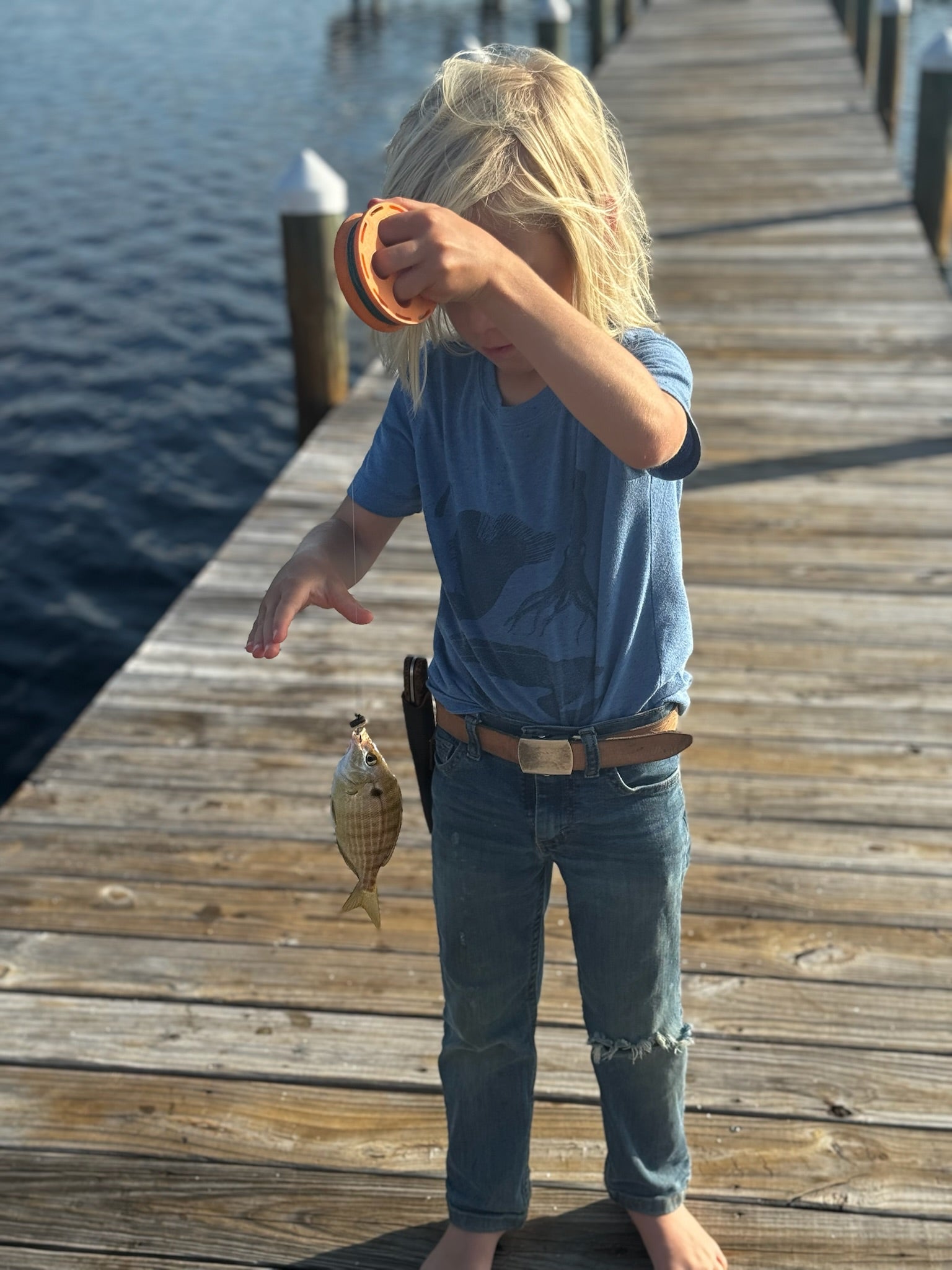 dock fishing with a hand reel