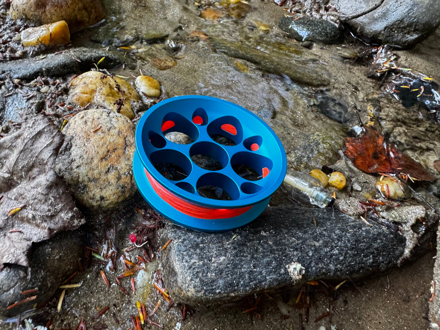 Blue GoReel Pro on a rock